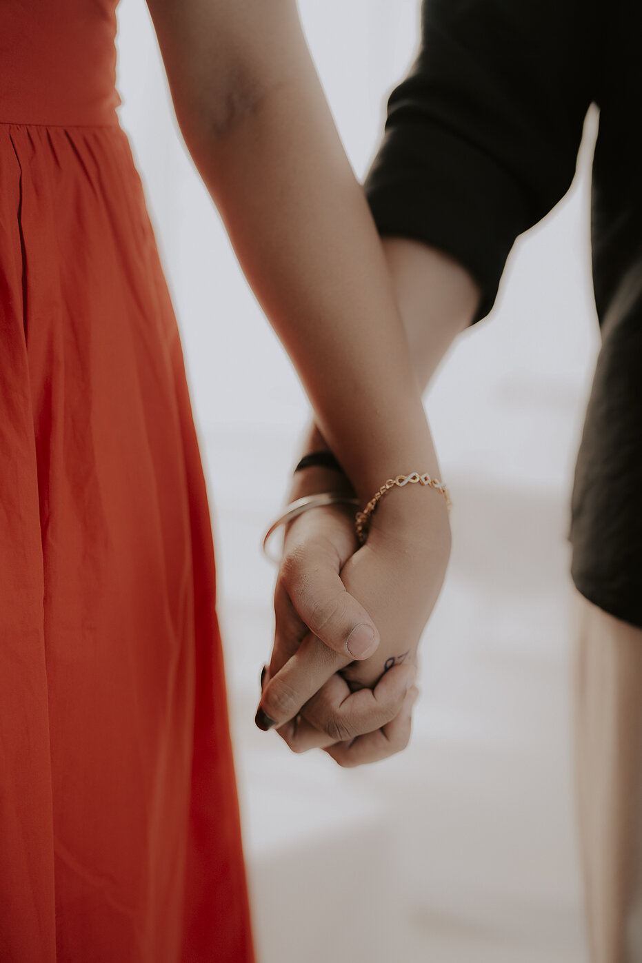 Navya and Subramanya holding hands, close up